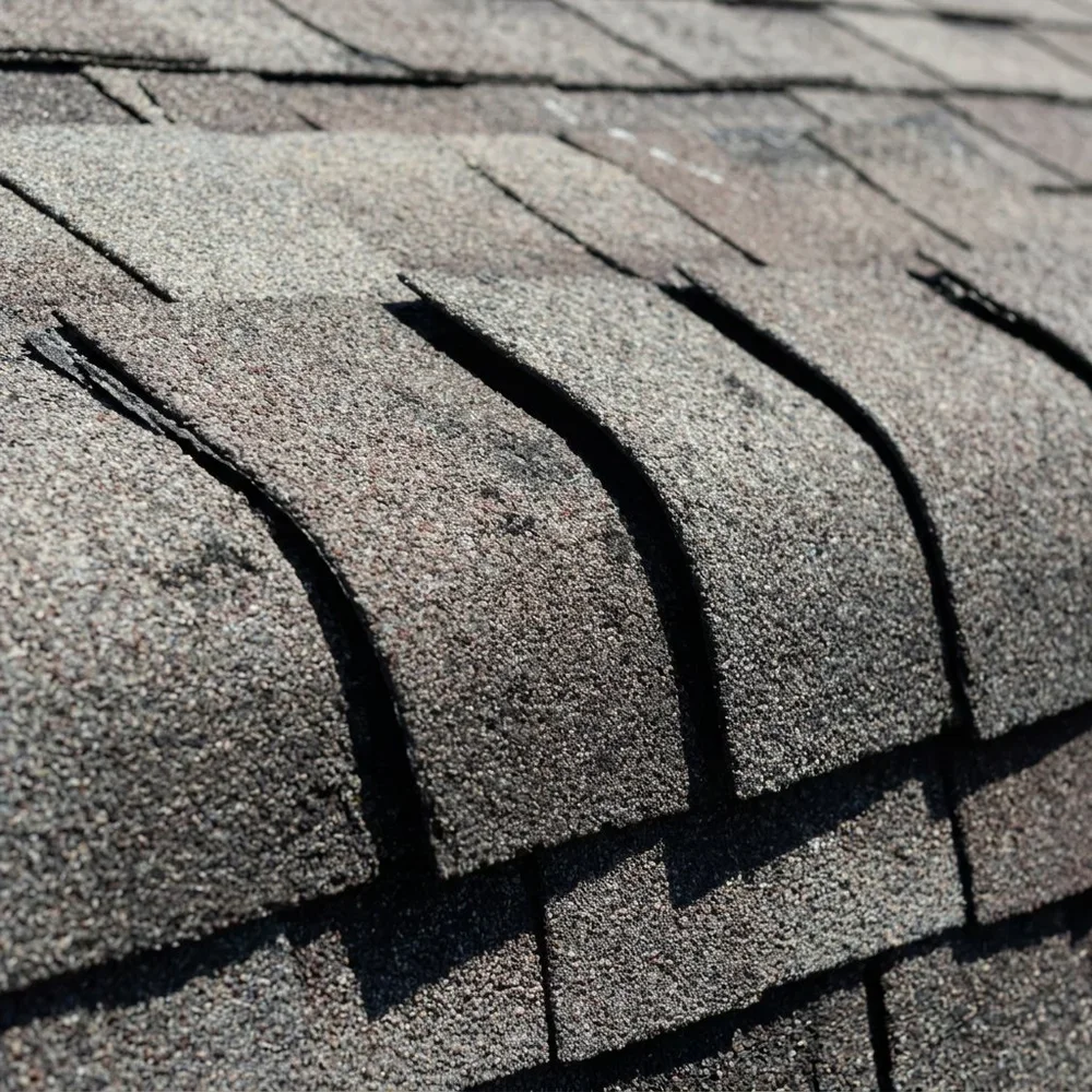 sever hail damaged ridge cap shingle