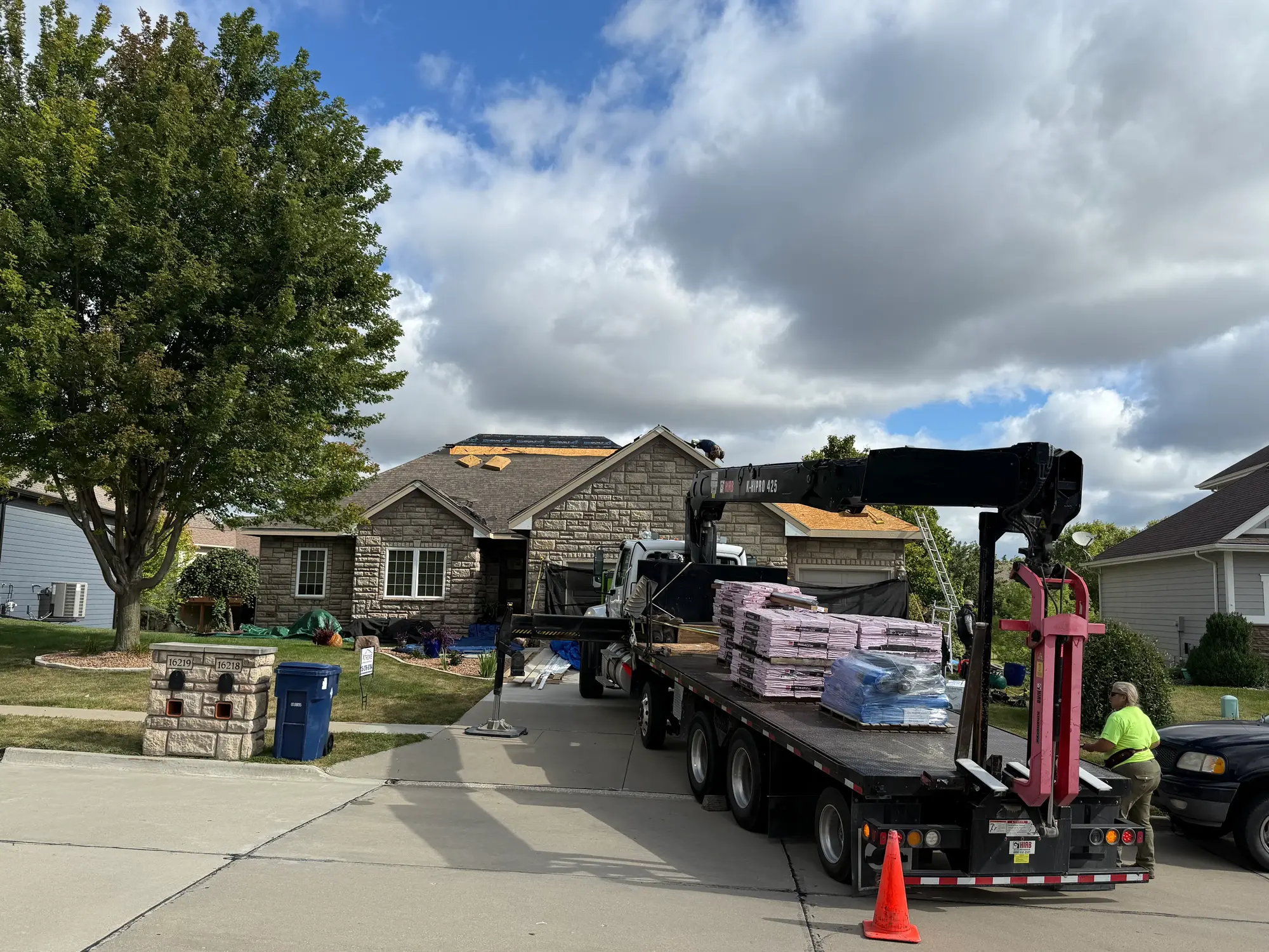 Residential roof loading Urbandale Iowa